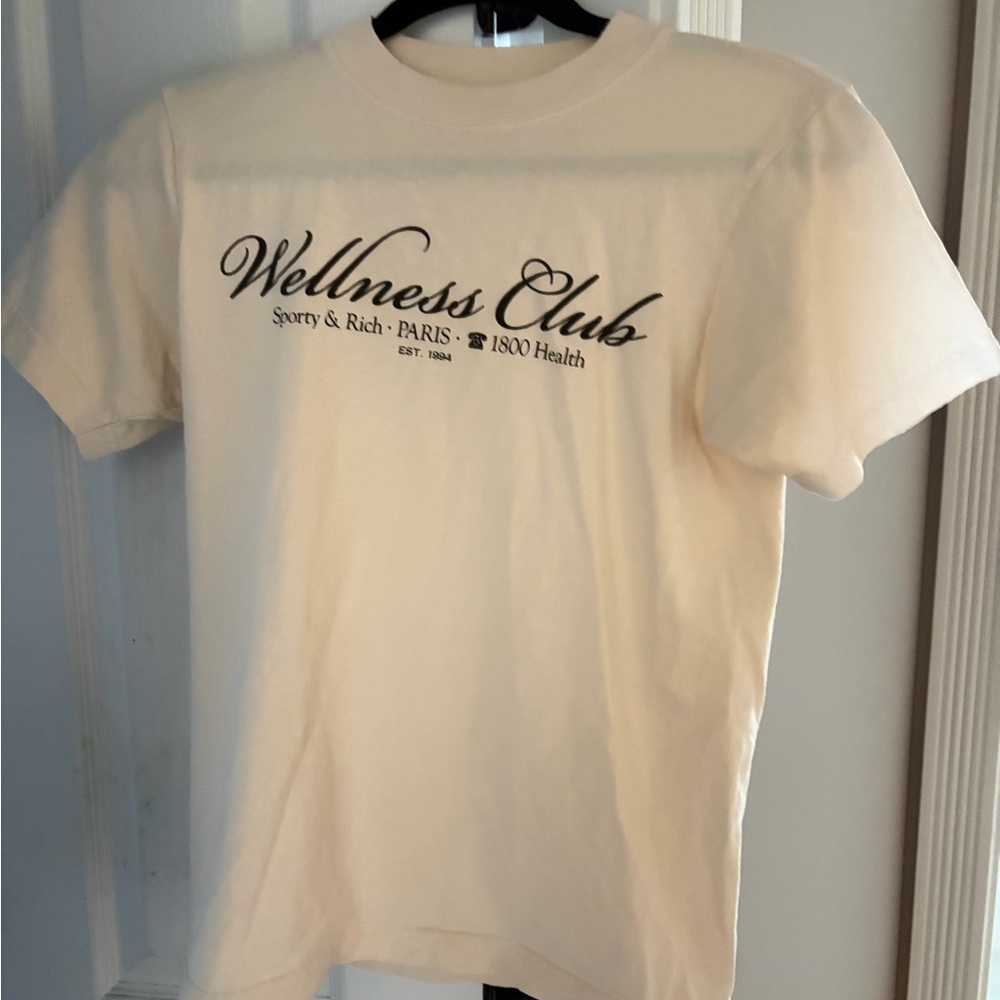 Sporty and rich Wellness Club Graphic Tee - Cream with Black Logo